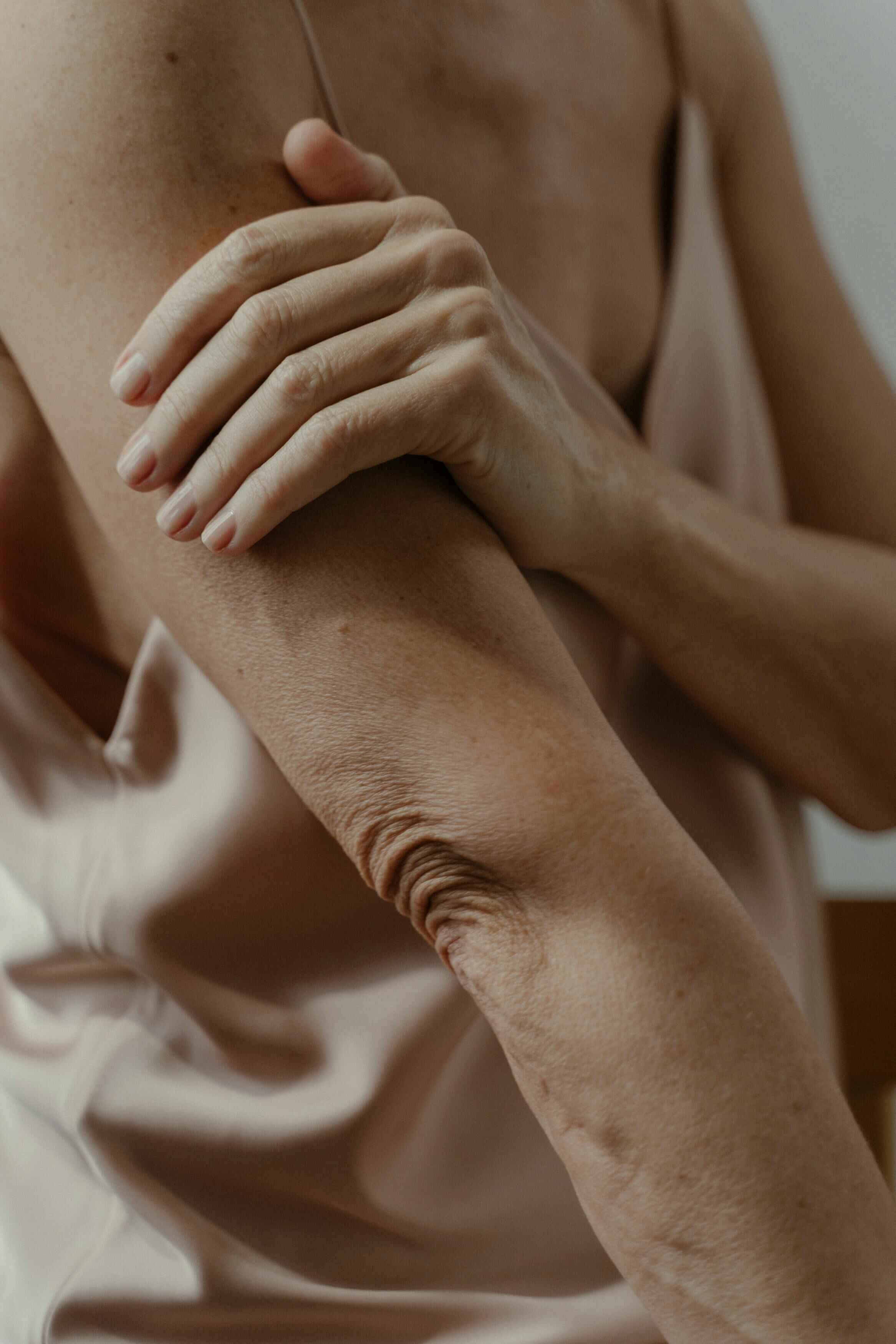 a woman with elbow joint pain